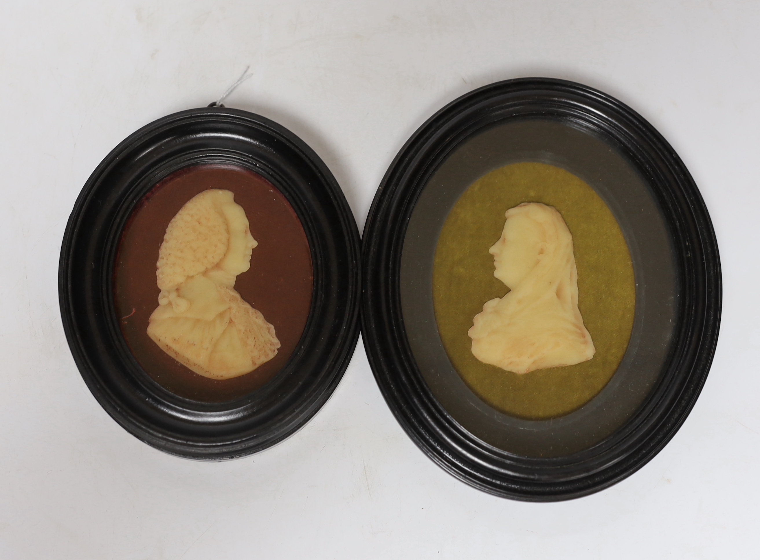 Two wax portraits in oval frames, William Murray the First Earl of Mansfield (1705-1793) and his wife Lady Elizabeth Finch, larger frame 18.5cm